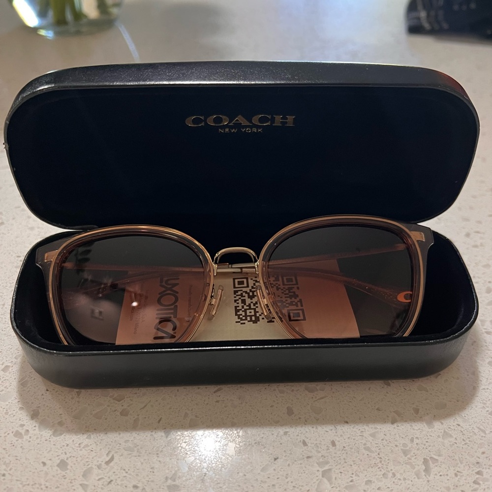 NEW Coach sunglasses. Never worn!
